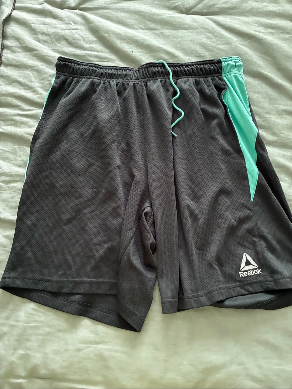 Reebok Men’s Black Athletic Shorts with Teal Trim